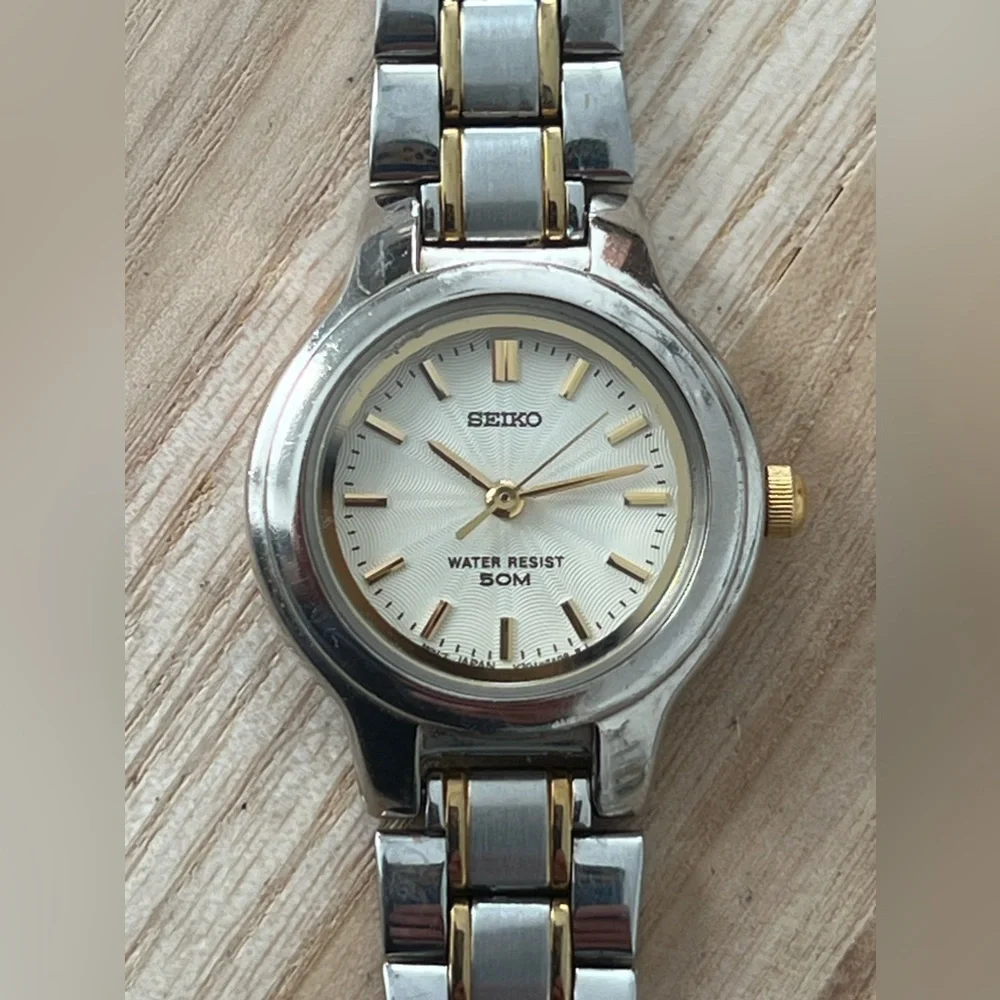 Seiko Ladies Watch Spiral Stainless Dial Gold-Tone Markers Two-Tone Bracelet